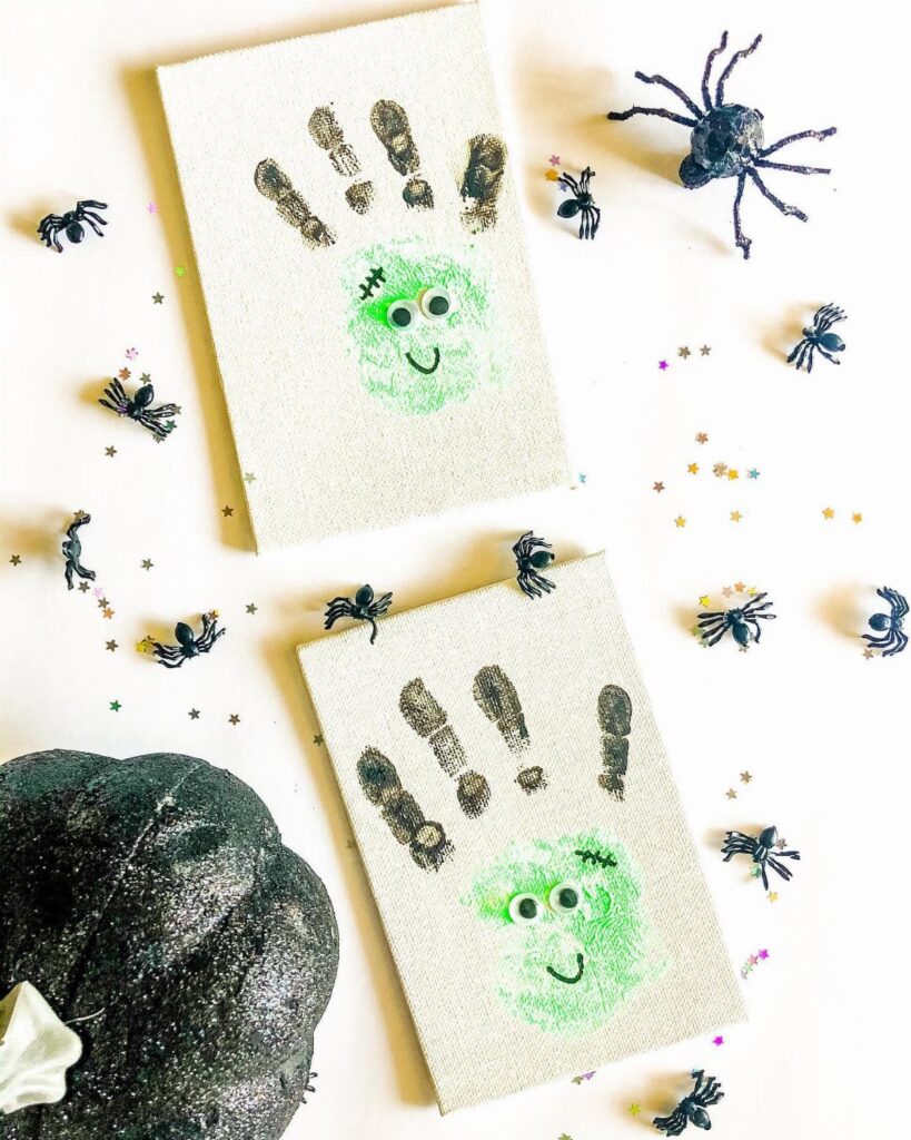 Two Frankenstein monster faces made from green handprints on small white canvases.